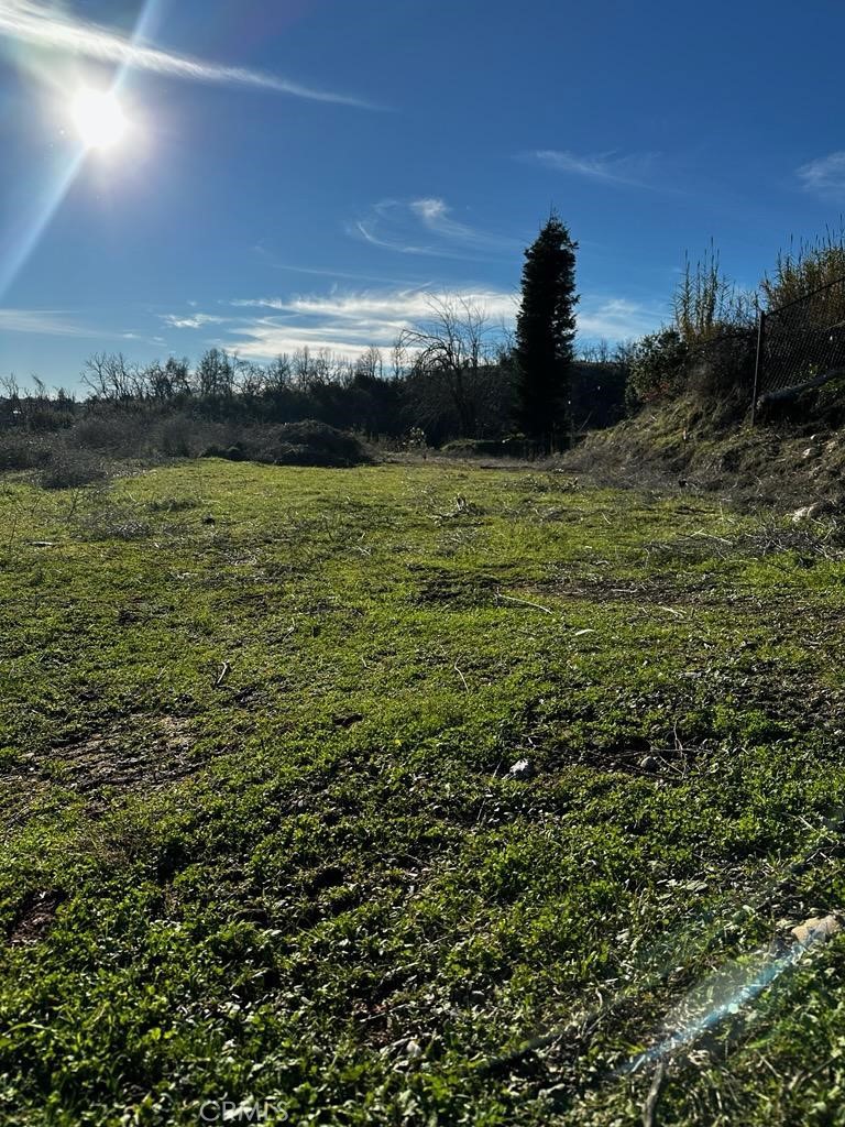 490 Turquoise Court Redding, CA 96003 - Photo 3 of 7 a view of lake with sunset
