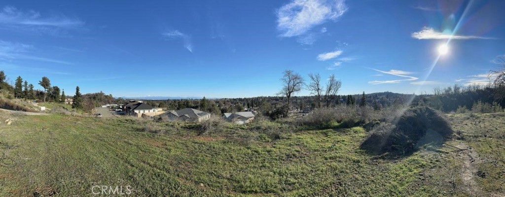 490 Turquoise Court Redding, CA 96003 - Photo 6 of 7 a view of a dry yard with lots of green space