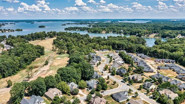 a view of a patio with table and chairs