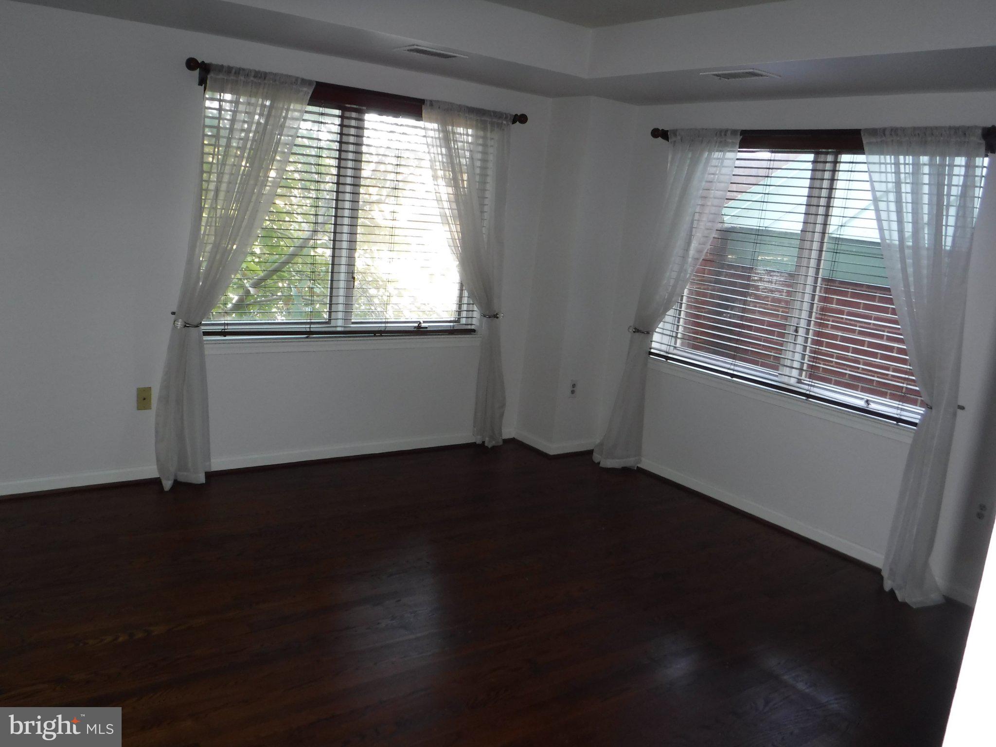 545 East Braddock Road, Unit 101 Alexandria, VA 22314 - Photo 14 of 46 Bright and airy room with natural light.
