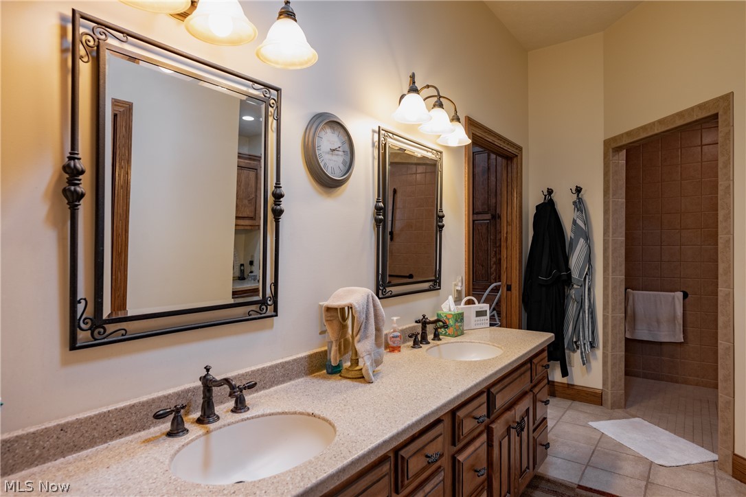 3908 River Road Vienna, WV 26105 - Photo 22 of 48 Master bath measures 10x16 with solid surface counters, double sinks and ceramic floors
