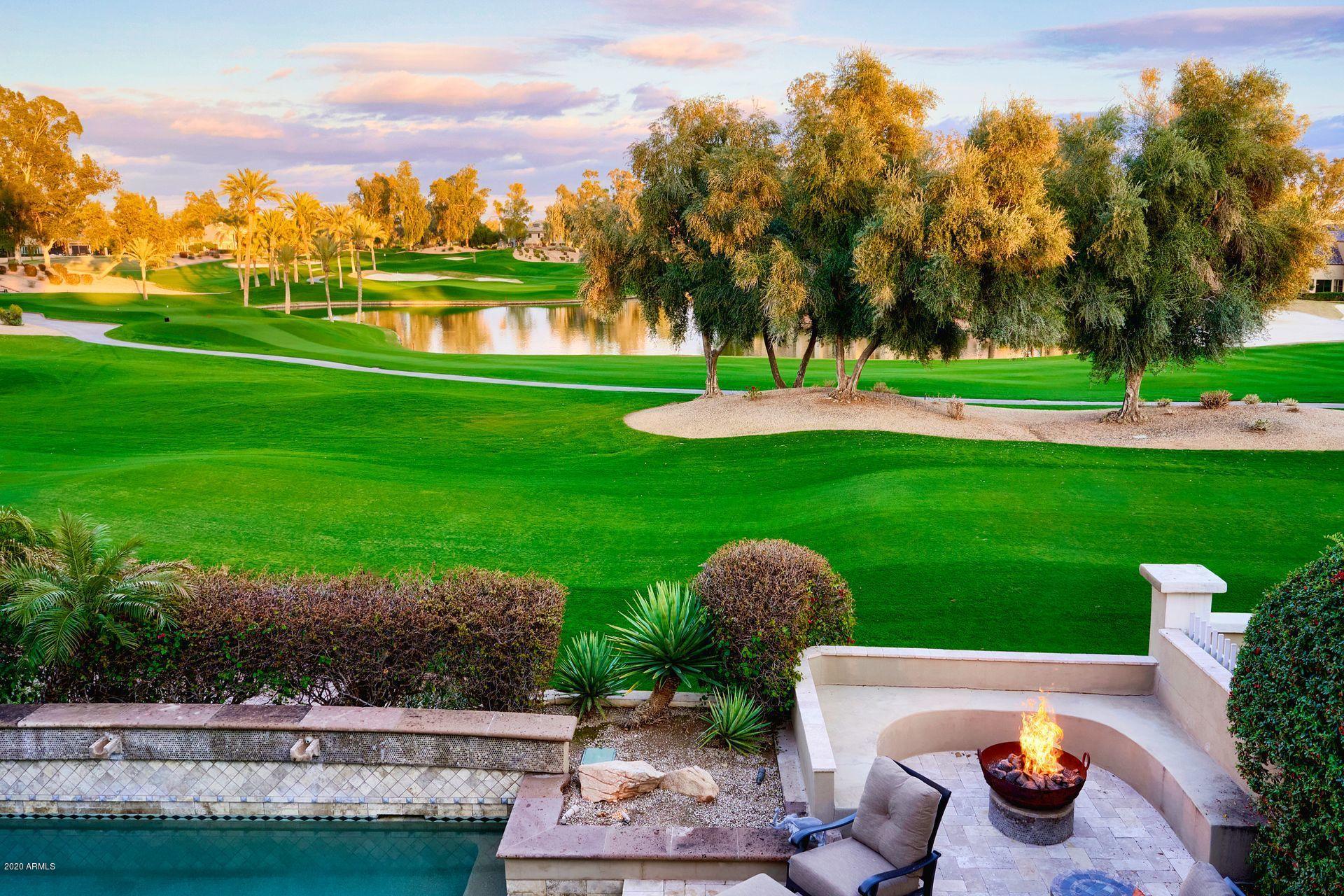 7323 East Gainey Ranch Road, Unit 4 Scottsdale, AZ 85258 - Photo 1 of 56 a garden view with a sitting space
