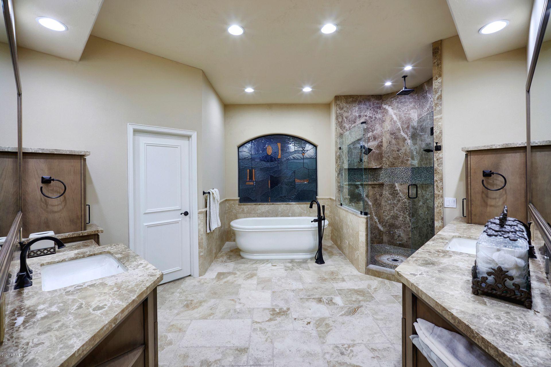 7323 East Gainey Ranch Road, Unit 4 Scottsdale, AZ 85258 - Photo 32 of 56 a living room with furniture and a couch