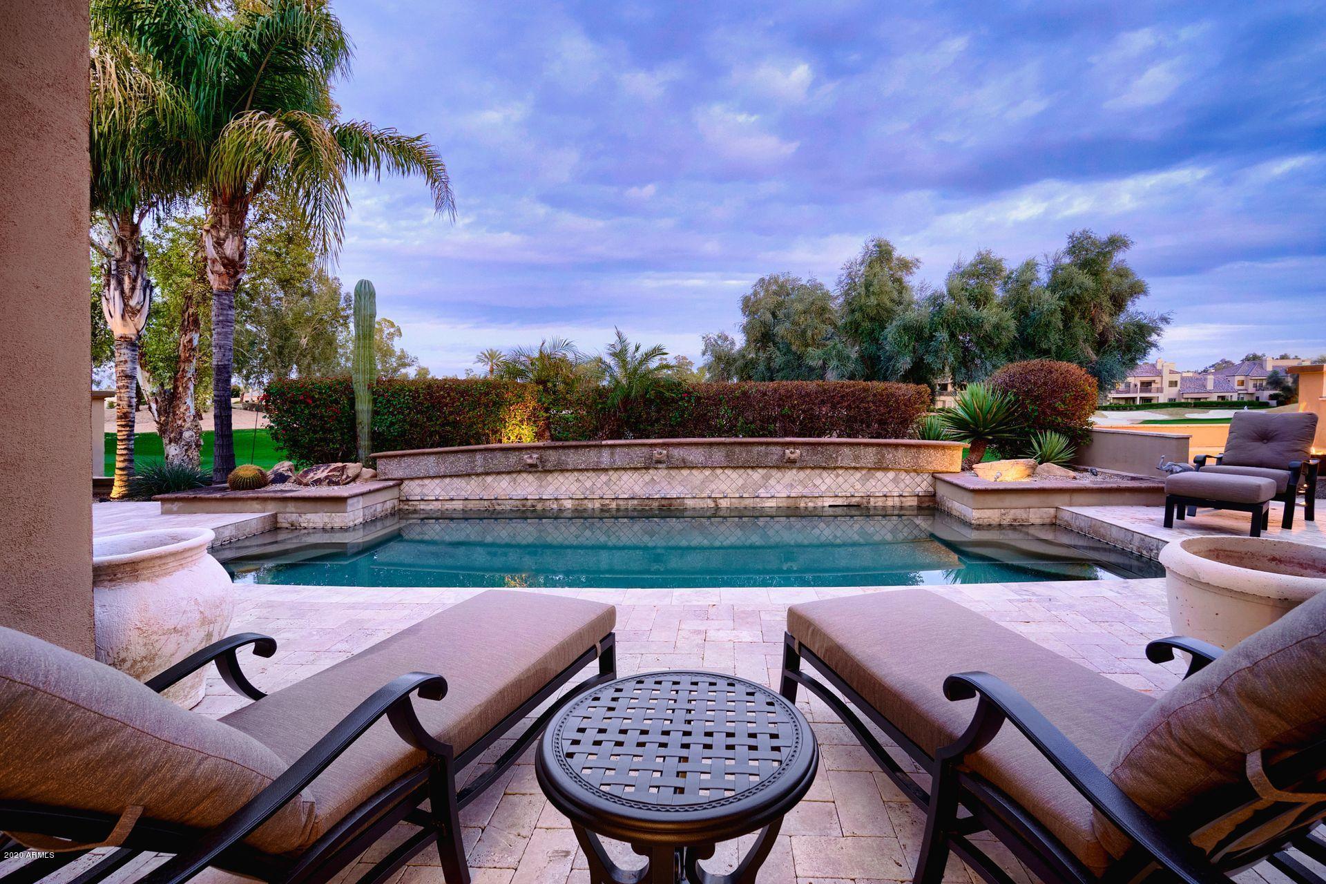 7323 East Gainey Ranch Road, Unit 4 Scottsdale, AZ 85258 - Photo 41 of 56 a view of a patio with chairs