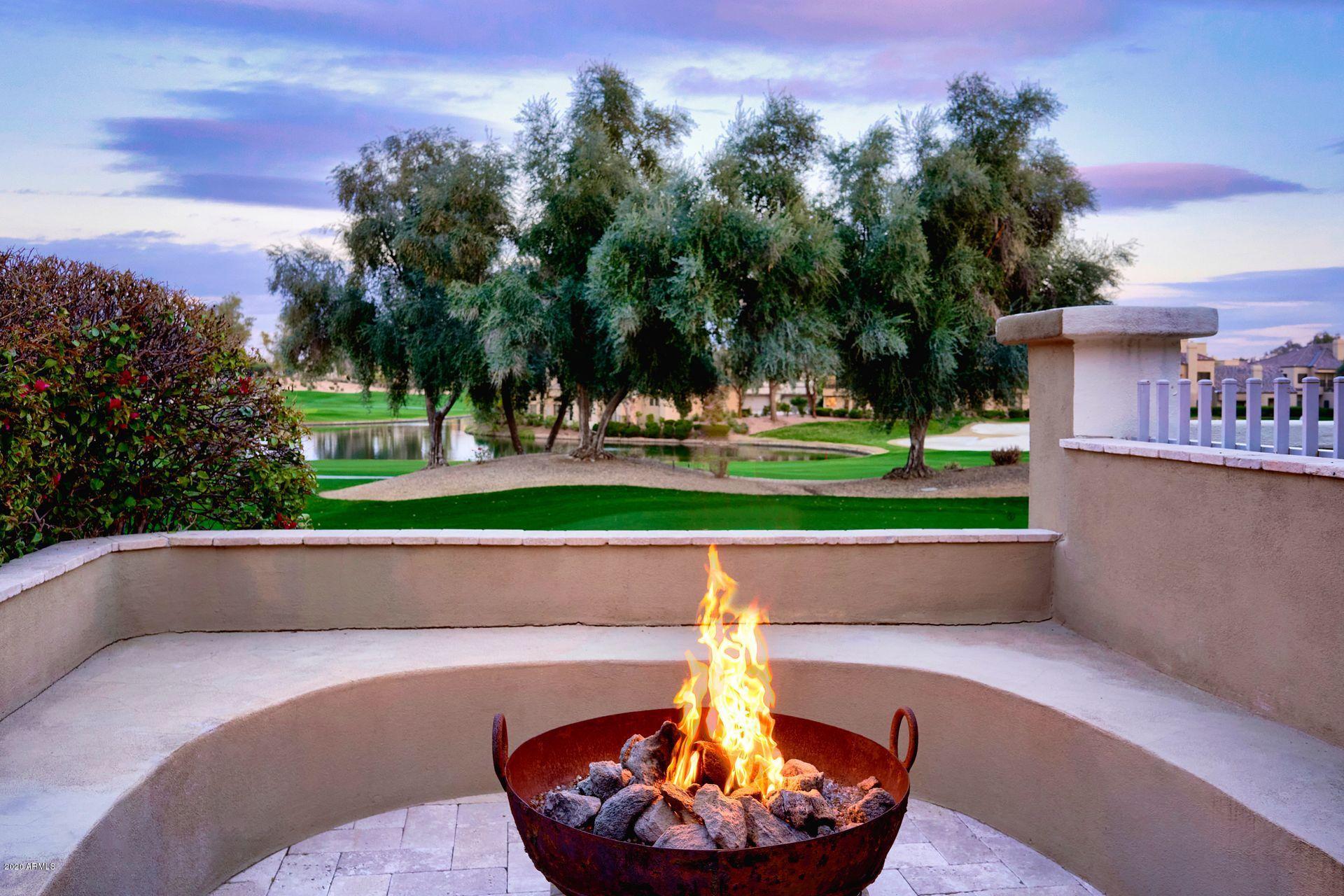 7323 East Gainey Ranch Road, Unit 4 Scottsdale, AZ 85258 - Photo 43 of 56 a outdoor view with a tub