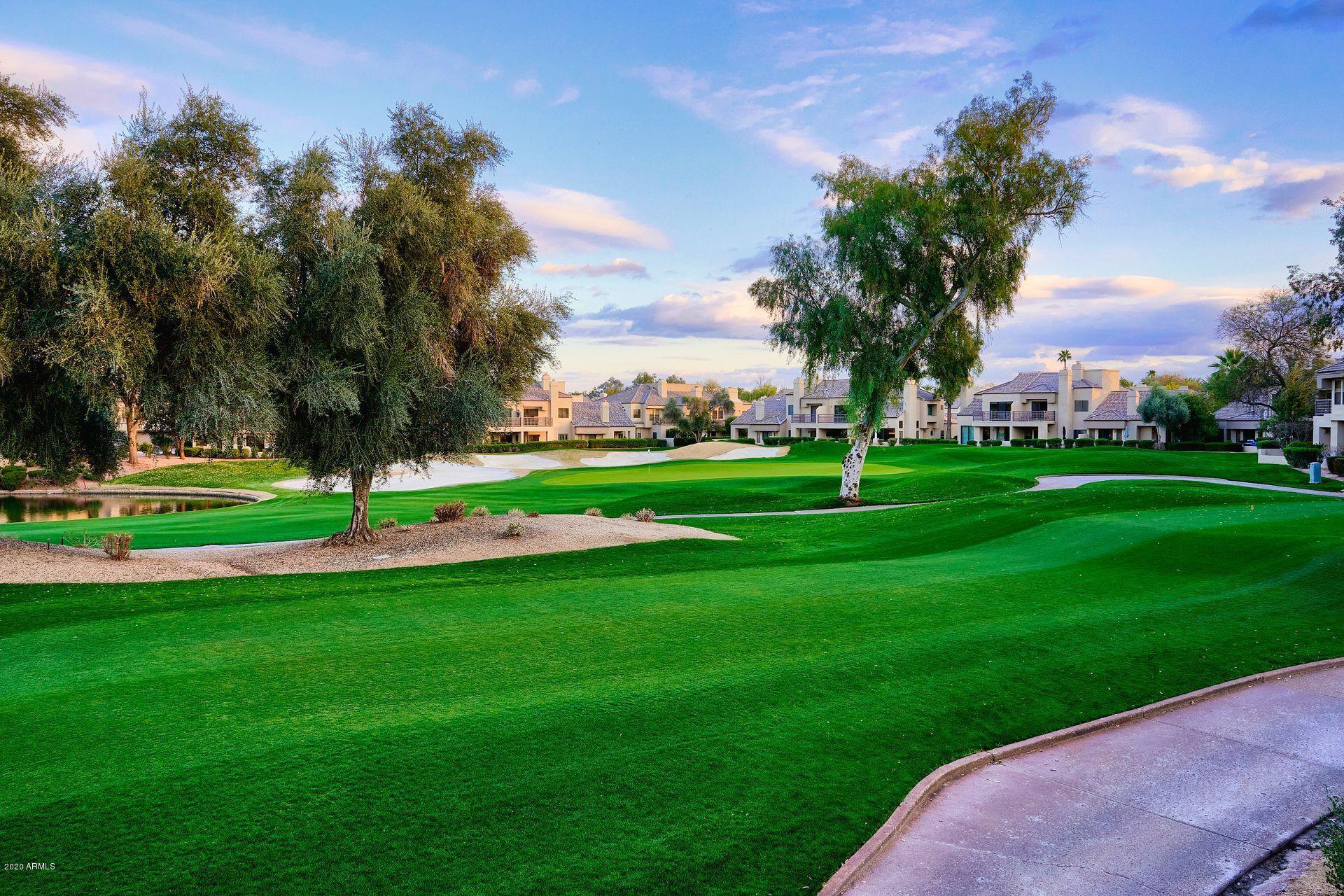 7323 East Gainey Ranch Road, Unit 4 Scottsdale, AZ 85258 - Photo 44 of 56 a view of a golf course