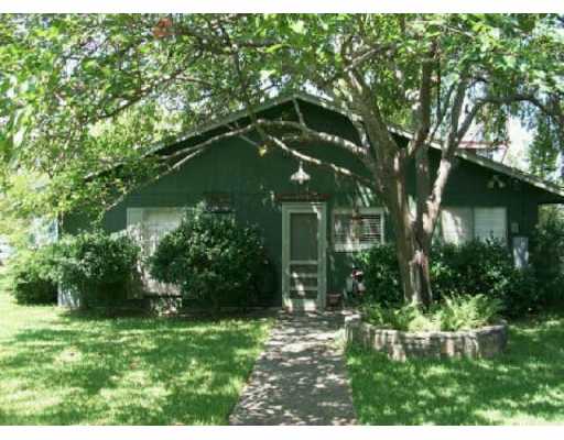 17137 Rocky Ridge Road Austin, TX 78734 - Photo 1 of 1 a backyard of a house with lots of green space
