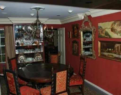 a room with furniture and chandelier