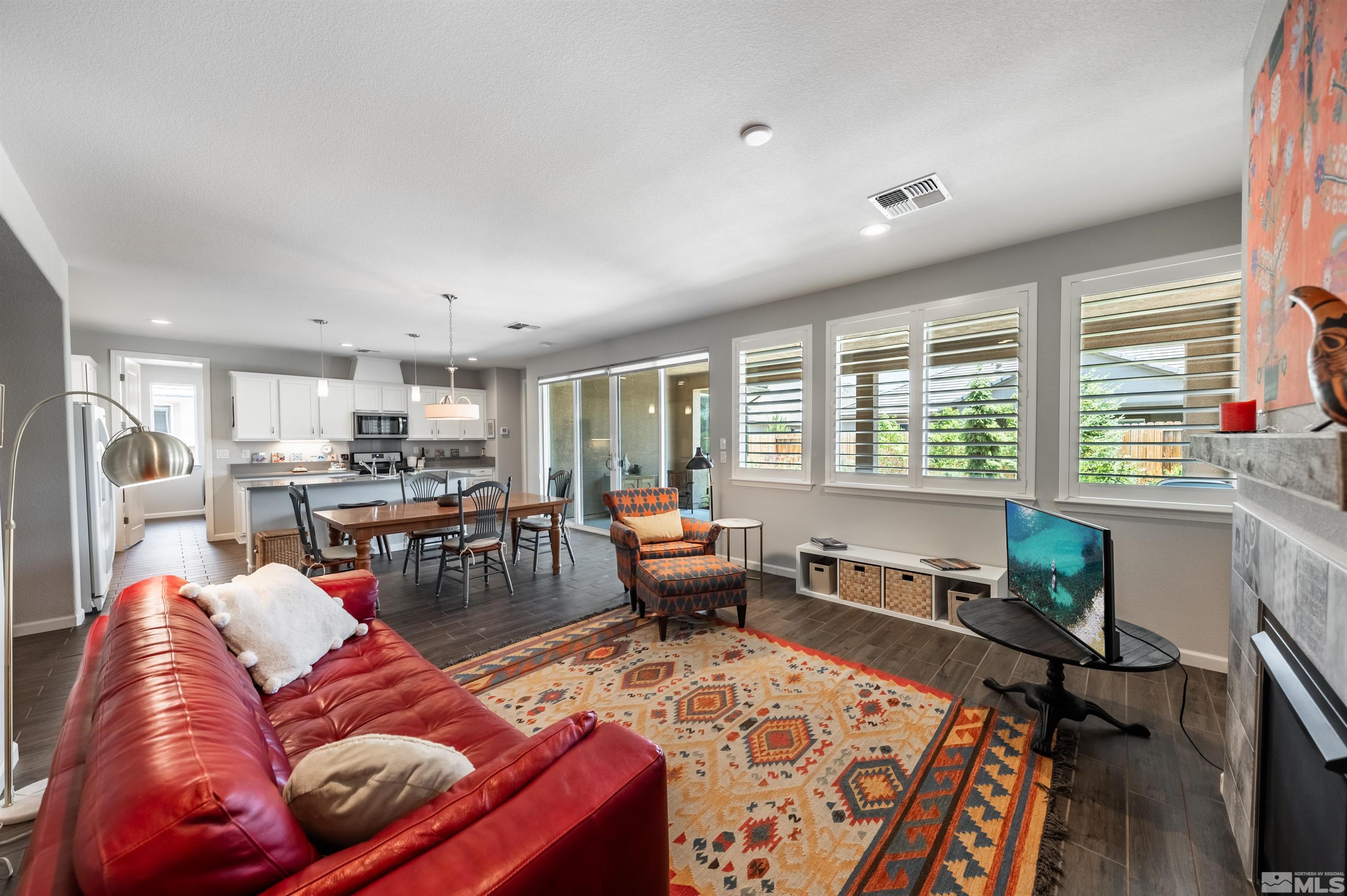 9566 Gazala Lane Reno, NV 89521 - Photo 6 of 40 a living room with furniture and a large window