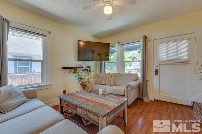 489 East 9th Street Reno, NV 89512 - Photo 3 of 19 a living room with furniture and a window