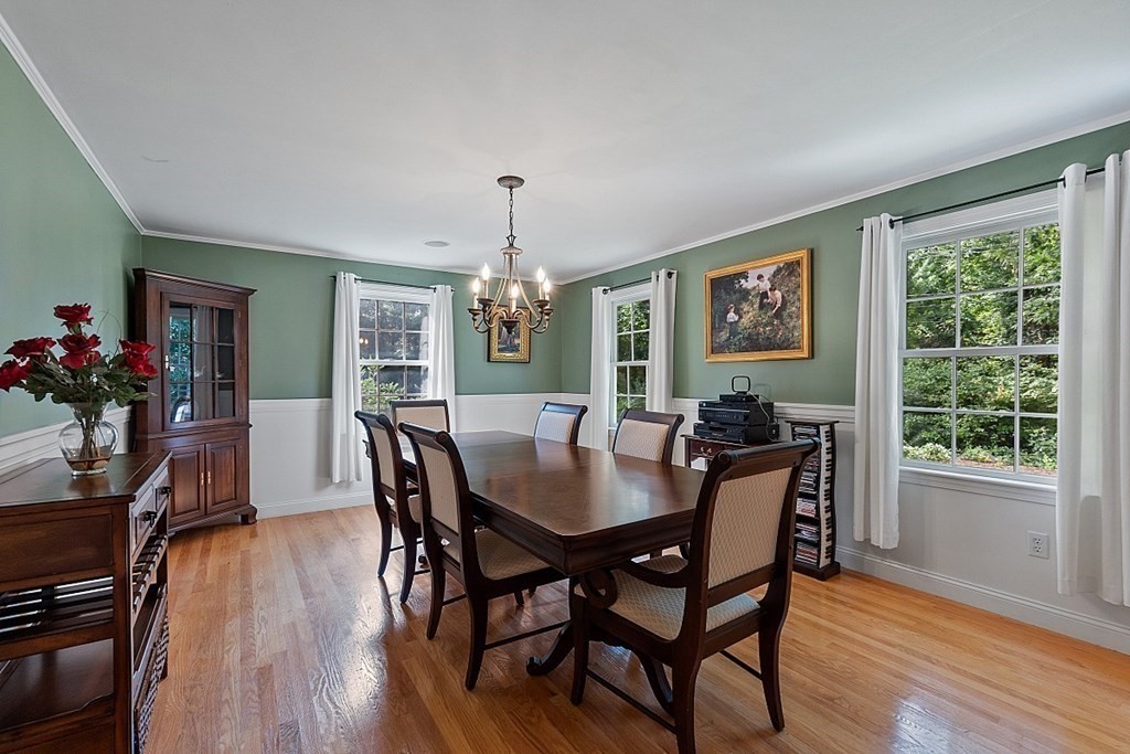 76 Wheeler Road Stow, MA 01775 - Photo 5 of 31 a view of a dining room with furniture window and wooden floor