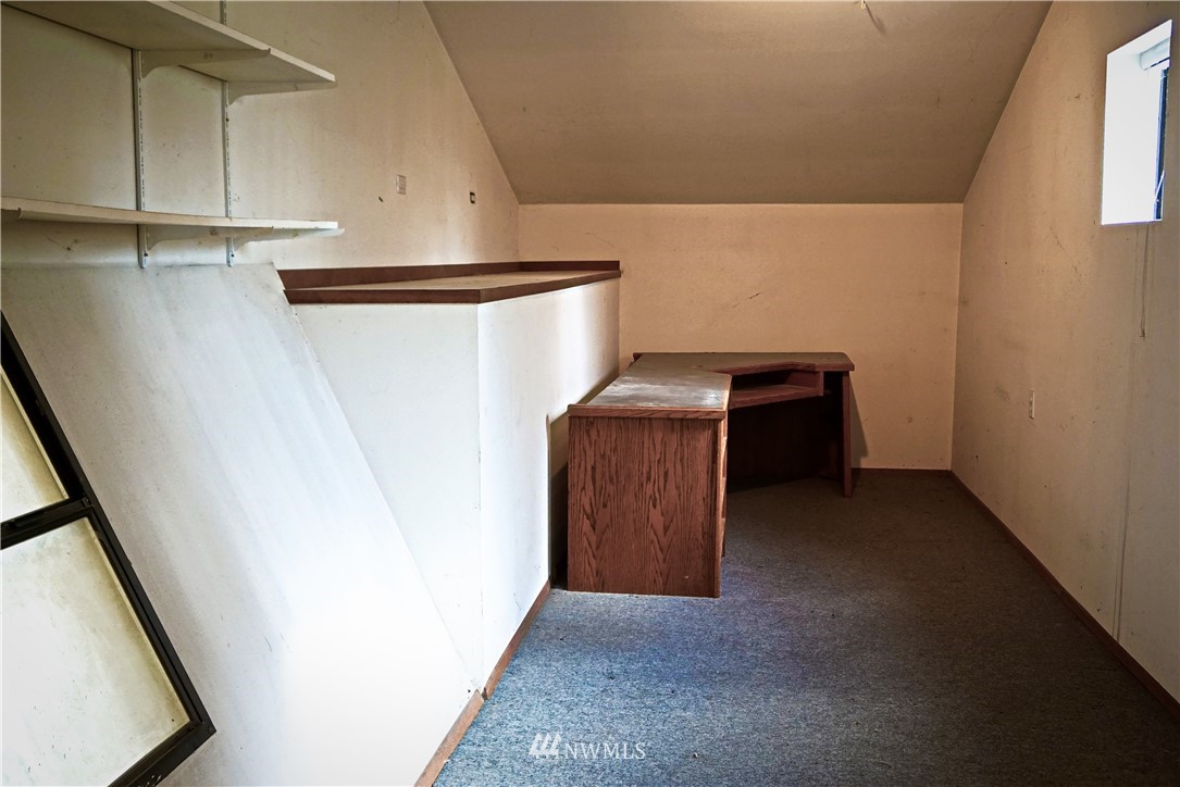 1746 Trigg Road Ferndale, WA 98248 - Photo 23 of 28 a view of storage and utility room with washer and dryer