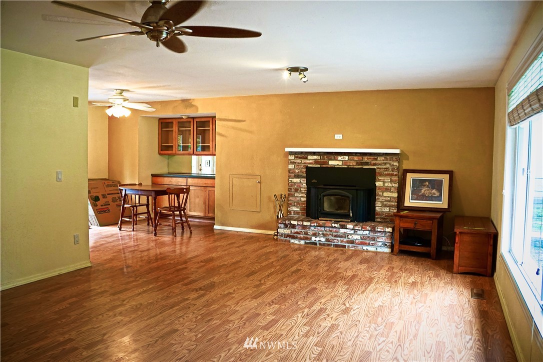 1746 Trigg Road Ferndale, WA 98248 - Photo 9 of 28 a view of a livingroom with furniture and a fireplace