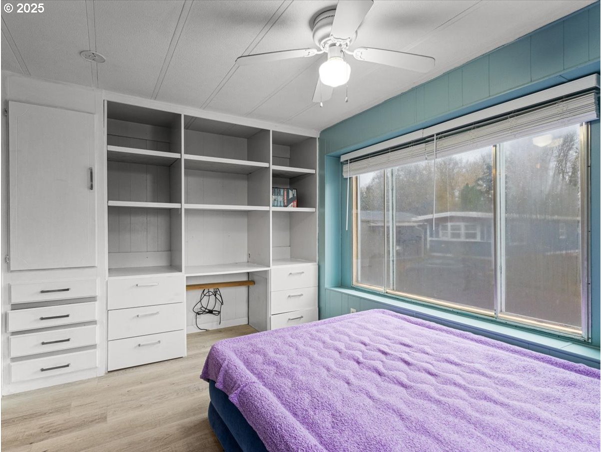 6610 Northwest Whitney Road, Unit 138 Vancouver, WA 98665 - Photo 25 of 34 a bedroom with a bed and a window
