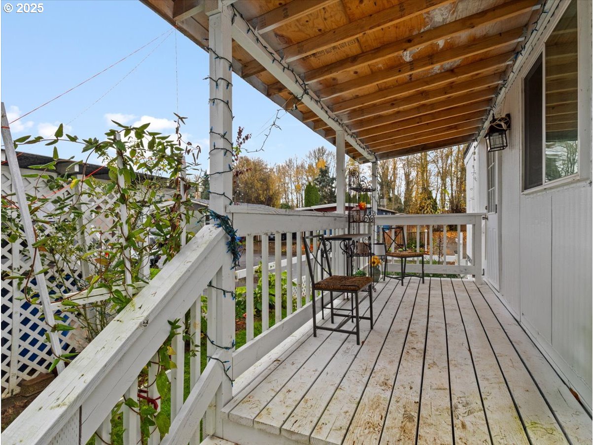 6610 Northwest Whitney Road, Unit 138 Vancouver, WA 98665 - Photo 33 of 34 a view of a balcony with wooden floor