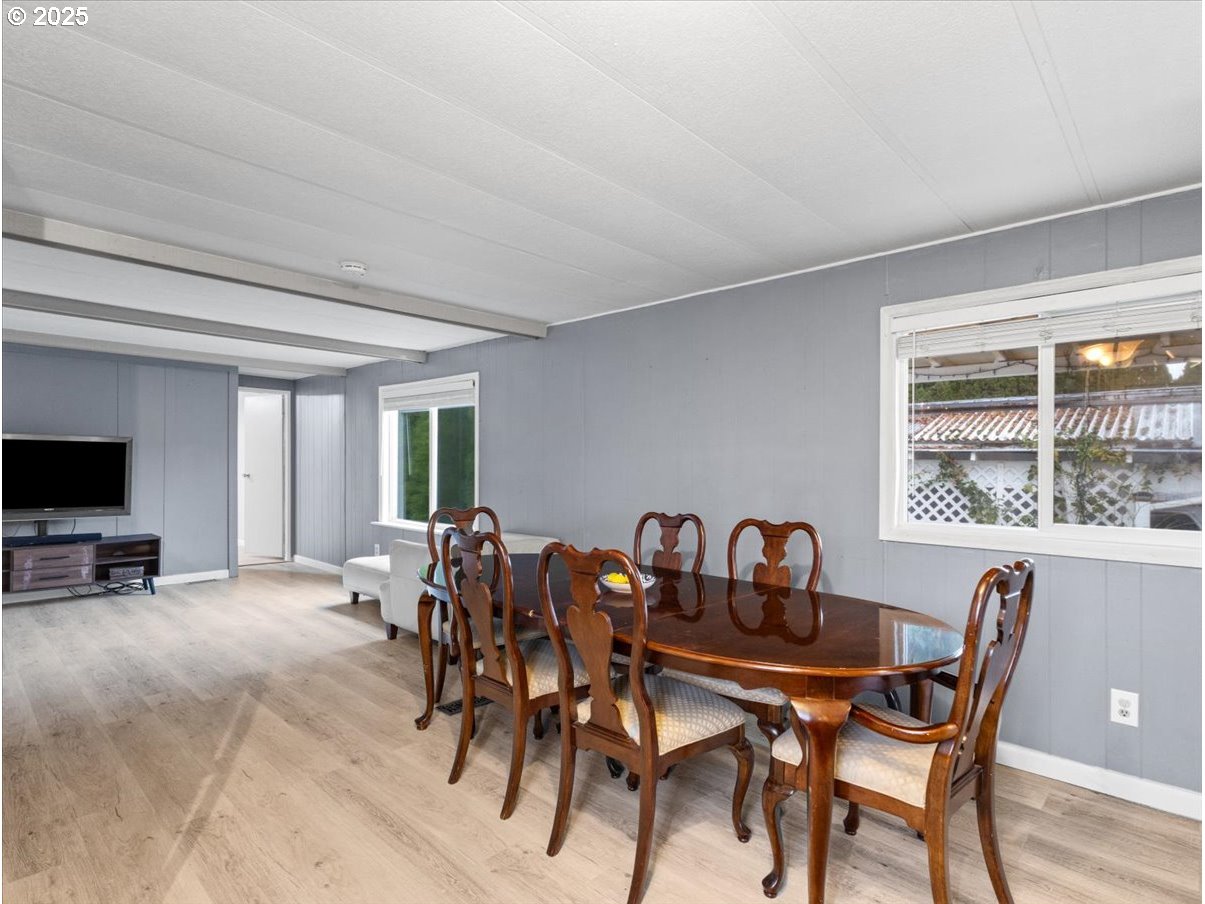 6610 Northwest Whitney Road, Unit 138 Vancouver, WA 98665 - Photo 10 of 34 a view of a dining room with furniture window and outside view