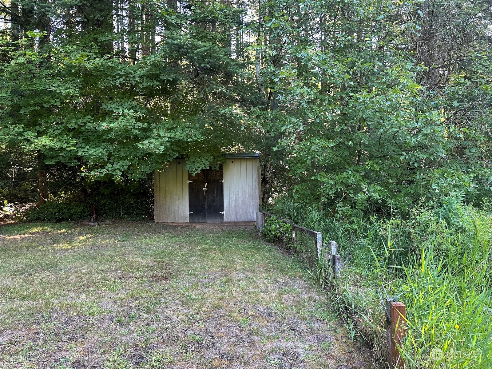 123 Marttala Road North Winlock, WA 98596 - Photo 11 of 17 a view of a house with a tree