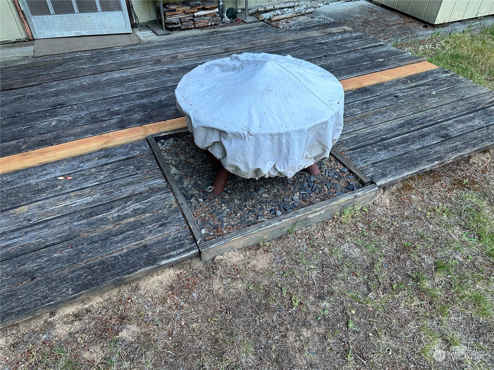 123 Marttala Road North Winlock, WA 98596 - Photo 7 of 17 a wooden bench sitting in the middle of a yard