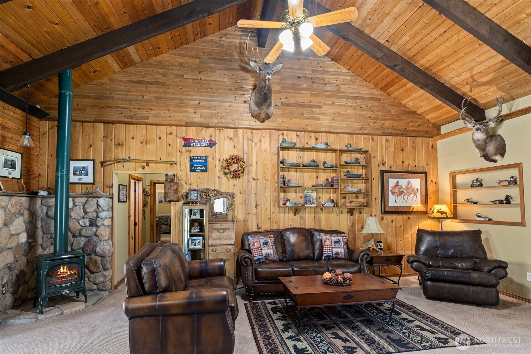 61 Lake Cabins Road Ronald, WA 98940 - Photo 11 of 29 a living room with furniture and a fireplace