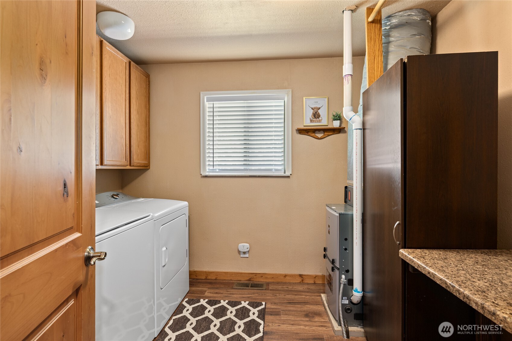 61 Lake Cabins Road Ronald, WA 98940 - Photo 18 of 29 a room with a refrigerator and a sink