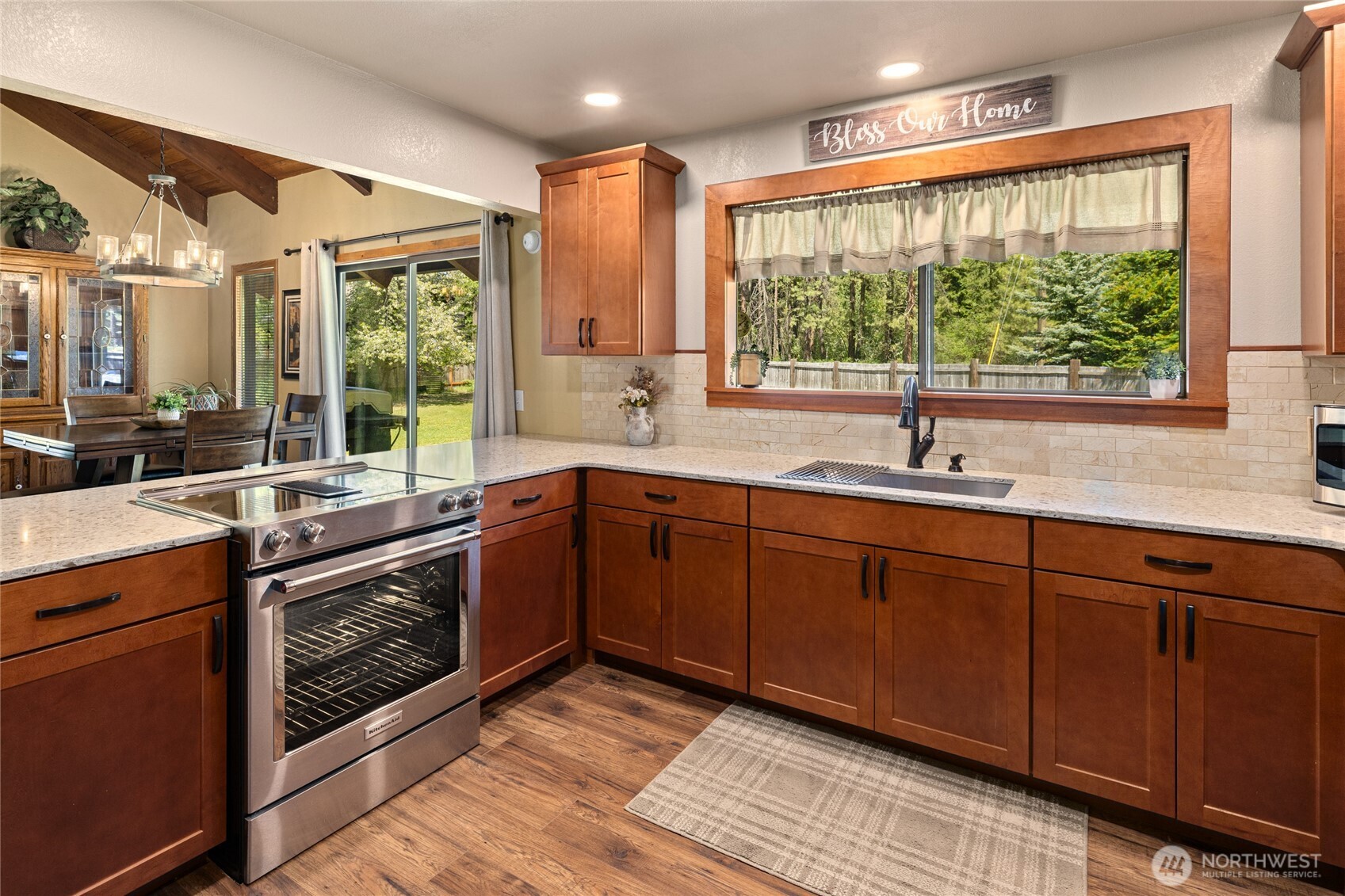 61 Lake Cabins Road Ronald, WA 98940 - Photo 9 of 29 a kitchen with stainless steel appliances granite countertop a sink and wooden cabinets