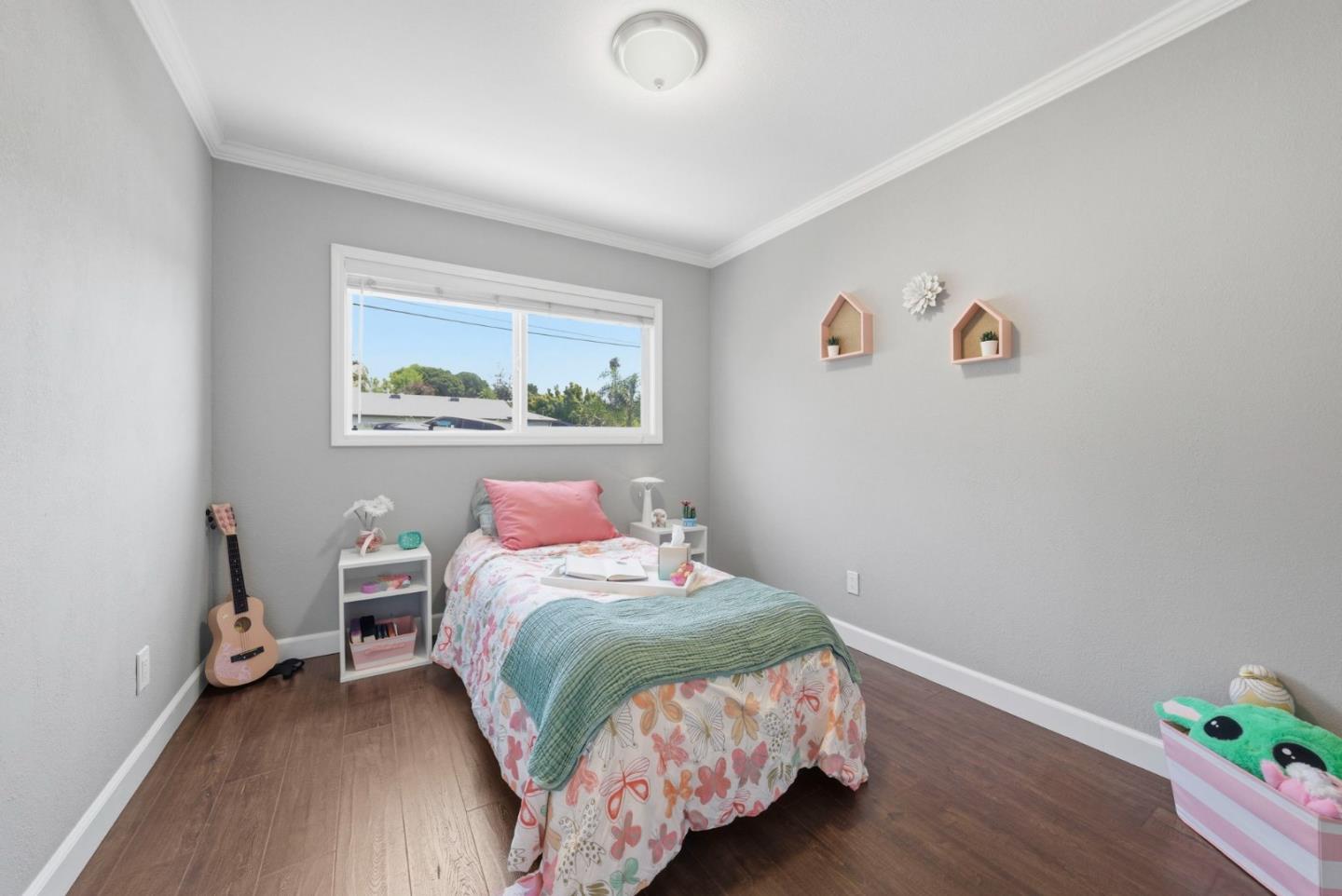 2793 Ruff Court Pinole, CA 94564 - Photo 21 of 53 a bedroom with a bed and a window