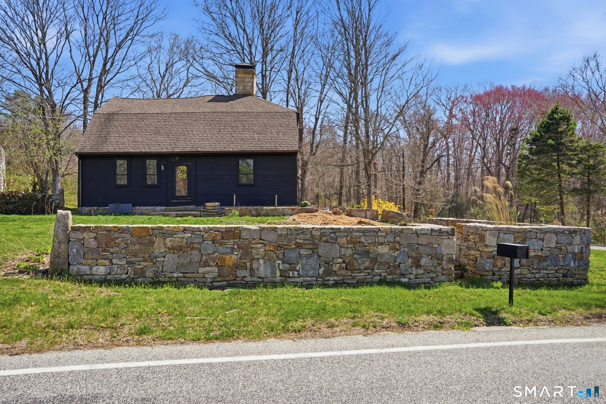 604 Pendleton Hill Road North Stonington, CT 06359 - Photo 3 of 39 a front view of a house with a yard