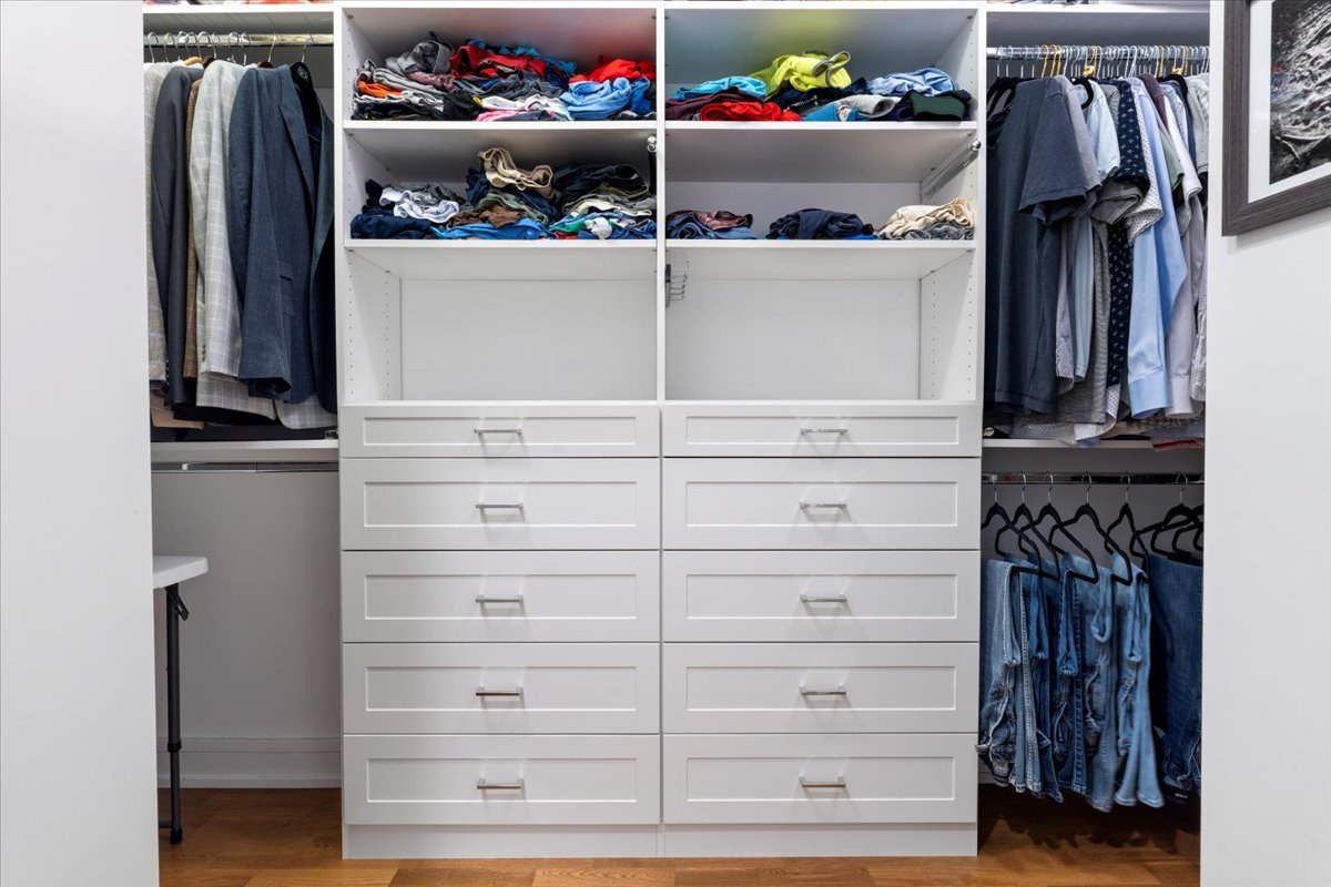 1515 North Mohawk Street, Unit 1 Chicago, IL 60610 - Photo 20 of 34 a view of walk in closet with clothes and shoes