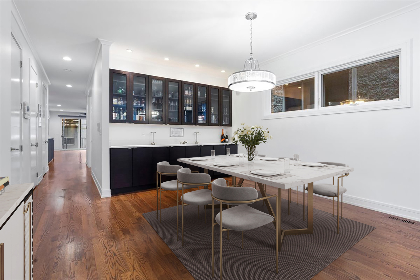 1515 North Mohawk Street, Unit 1 Chicago, IL 60610 - Photo 5 of 34 a dining room with furniture a chandelier and wooden floor