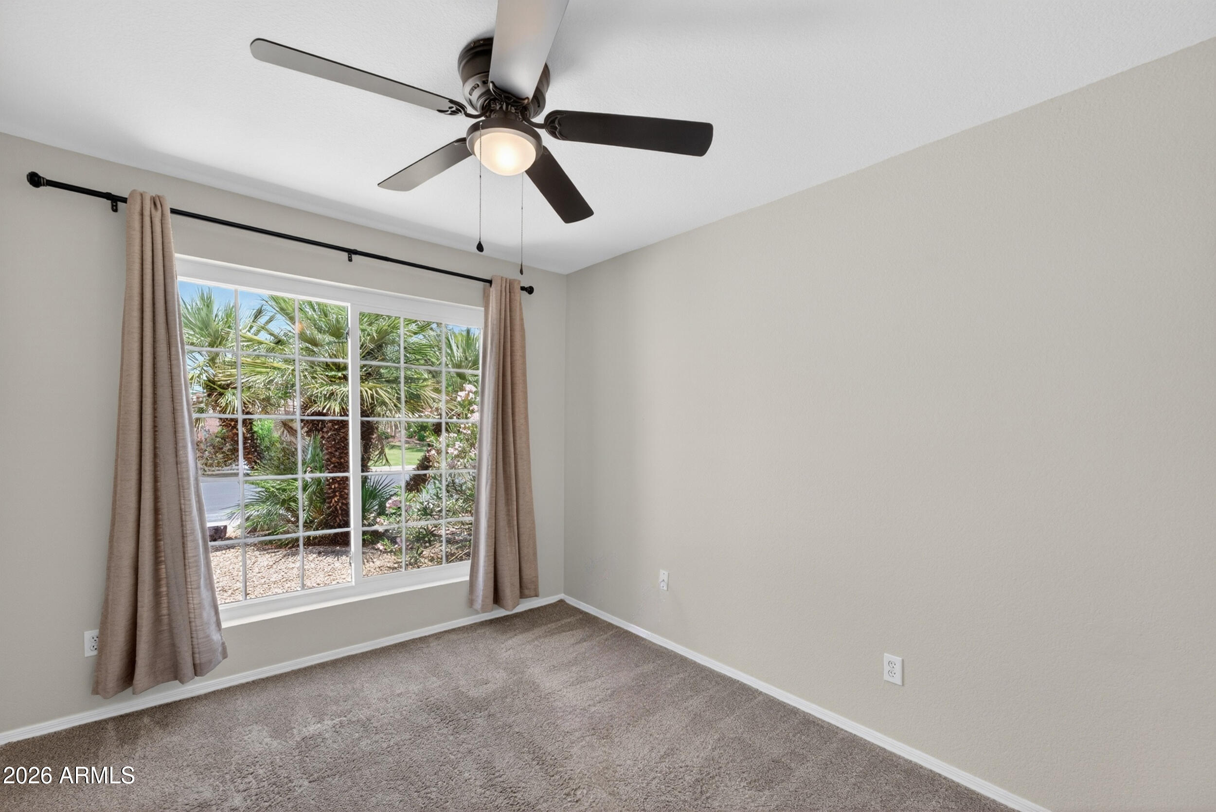 4729 West Monterey Street Chandler, AZ 85226 - Photo 8 of 50 an empty room with windows and ceiling fan