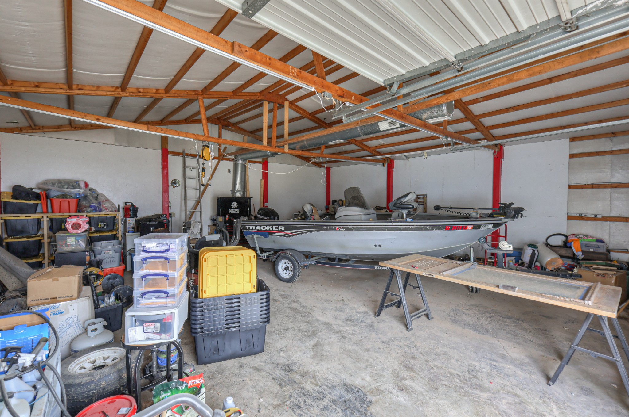 636 Warner Bridge Road Shelbyville, TN 37160 - Photo 25 of 32 a room with gym equipment and lots of furniture