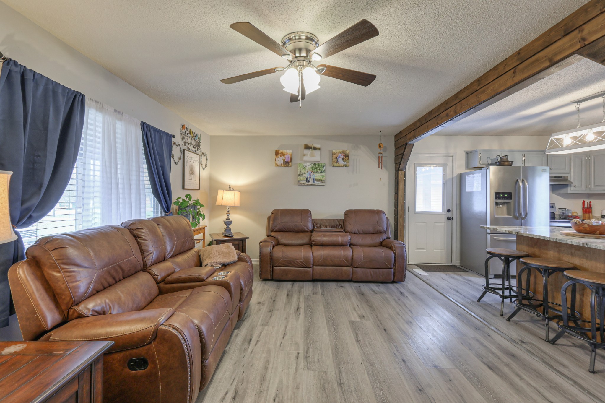 636 Warner Bridge Road Shelbyville, TN 37160 - Photo 4 of 32 a living room with furniture and a wooden floor