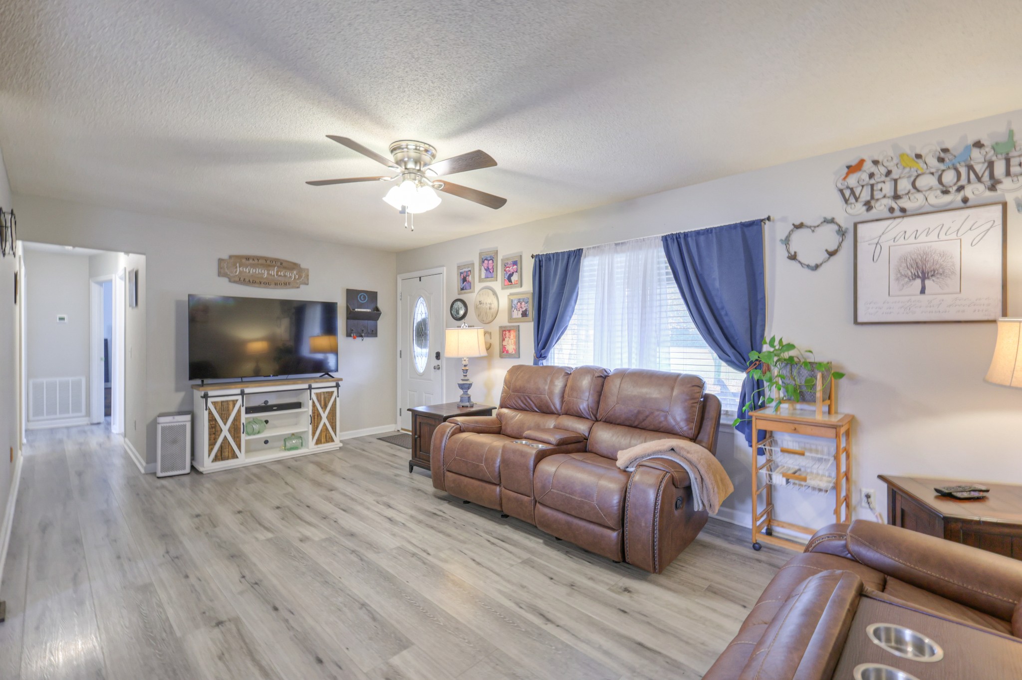 636 Warner Bridge Road Shelbyville, TN 37160 - Photo 7 of 32 a living room with furniture and a flat screen tv