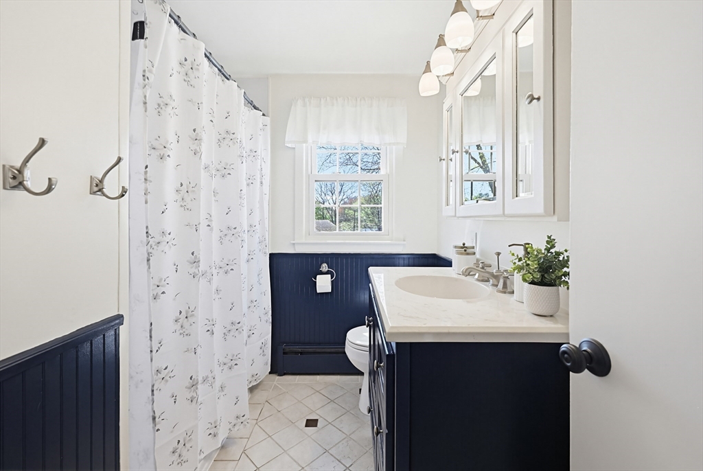 18 Anchorage Road Franklin, MA 02038 - Photo 37 of 42 a bathroom with a sink a toilet and shower