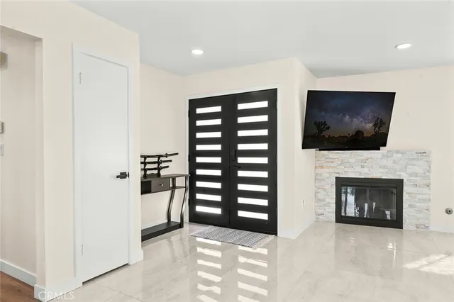 a view of a livingroom with a fireplace