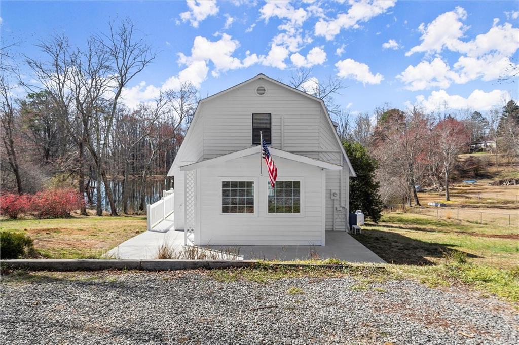 942 Gerrells Road Cleveland, GA 30528 - Photo 1 of 1 a front view of a house with a yard