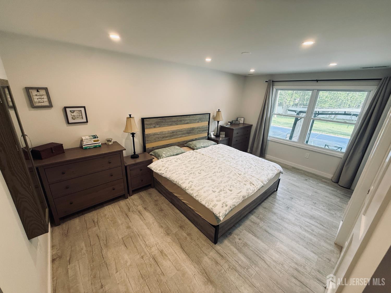566 Ticetown Road Old Bridge, NJ 08857 - Photo 15 of 23 a bedroom with a bed window and dresser