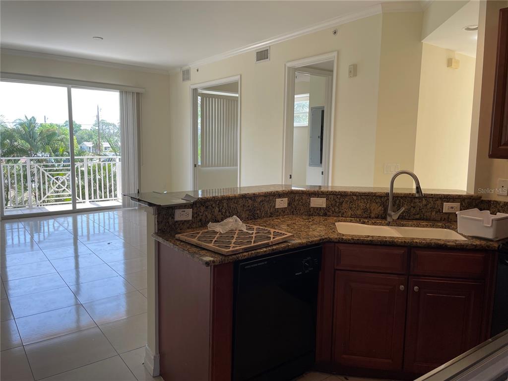 4400-4420 Bonita Beach Walk Drive, Unit MULTI Bonita Springs, FL 34134 - Photo 19 of 67 a bathroom with a granite countertop sink and a window