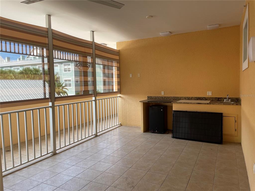 4400-4420 Bonita Beach Walk Drive, Unit MULTI Bonita Springs, FL 34134 - Photo 27 of 67 a view of an empty room with a fireplace and a window