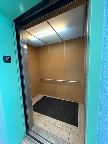 a bathroom with a tub and shower