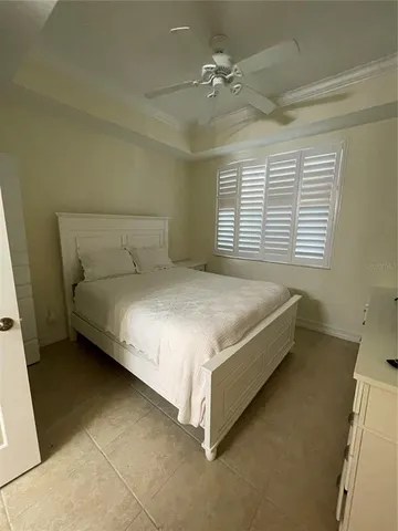 a view of a room with a large window with outer view