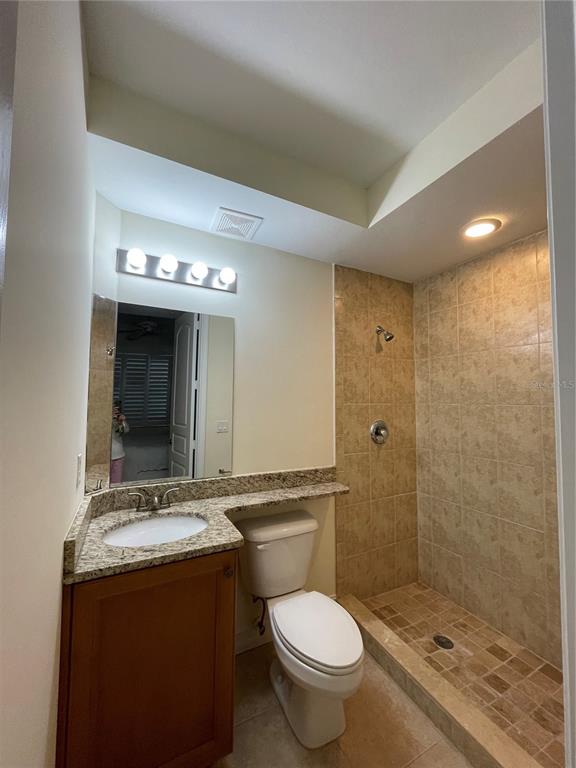 4400-4420 Bonita Beach Walk Drive, Unit MULTI Bonita Springs, FL 34134 - Photo 47 of 67 a bathroom with a sink and mirror