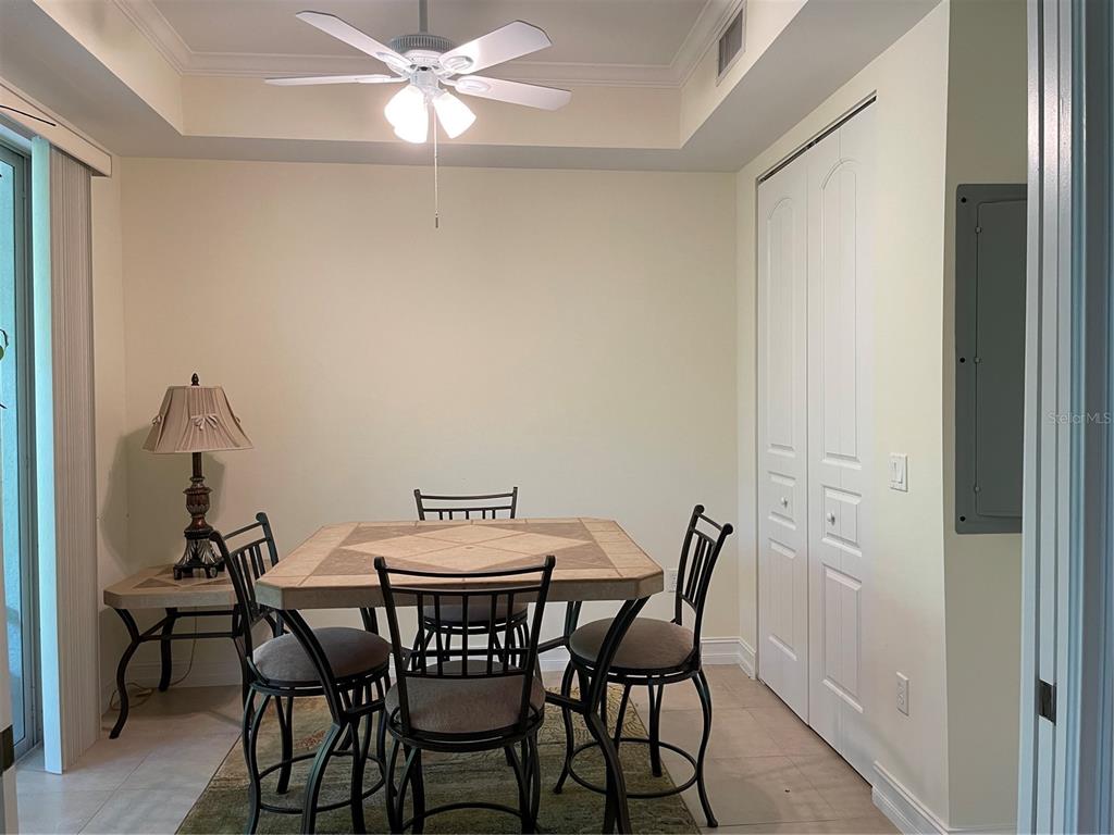 4400-4420 Bonita Beach Walk Drive, Unit MULTI Bonita Springs, FL 34134 - Photo 9 of 67 a view of a dining room with furniture and wooden floor