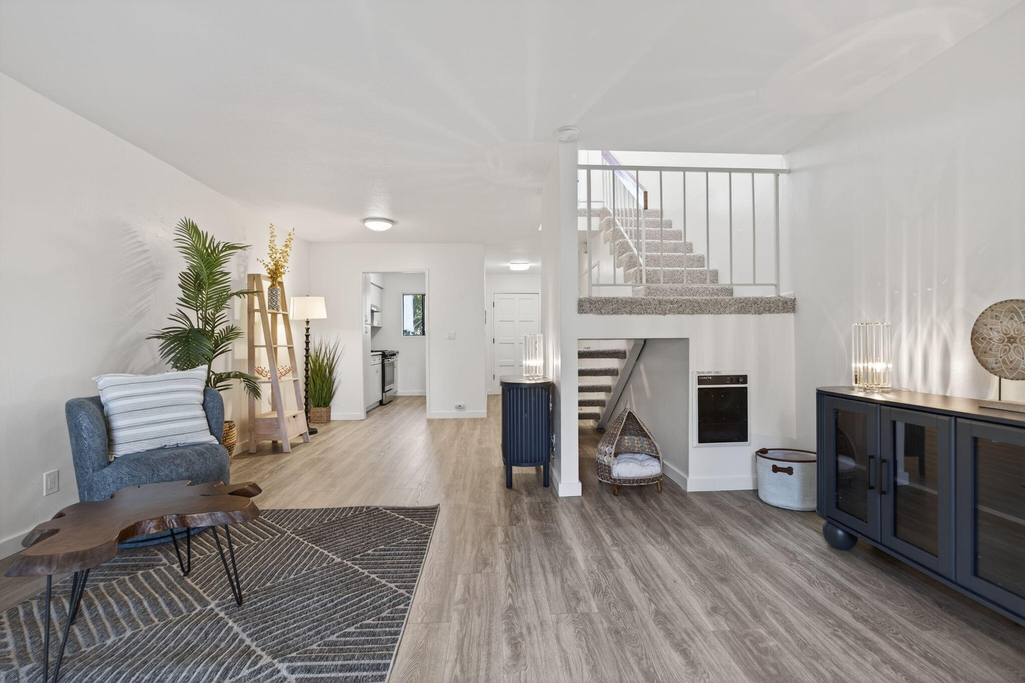 969 Miramonte Drive, Unit 5 Santa Barbara, CA 93109 - Photo 4 of 27 a living room with furniture and a fireplace