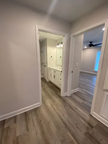 wooden floor and closet in a room