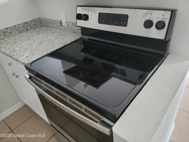 a view of room with window and hardwood floor
