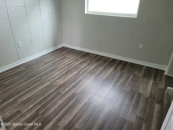 a bathroom with a sink a toilet and bathtub