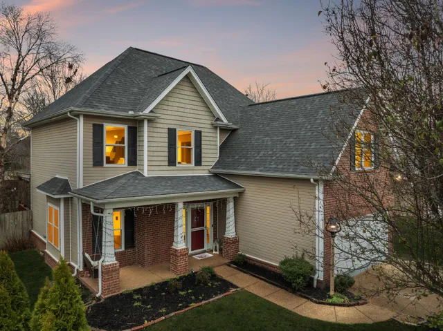a front view of house with yard