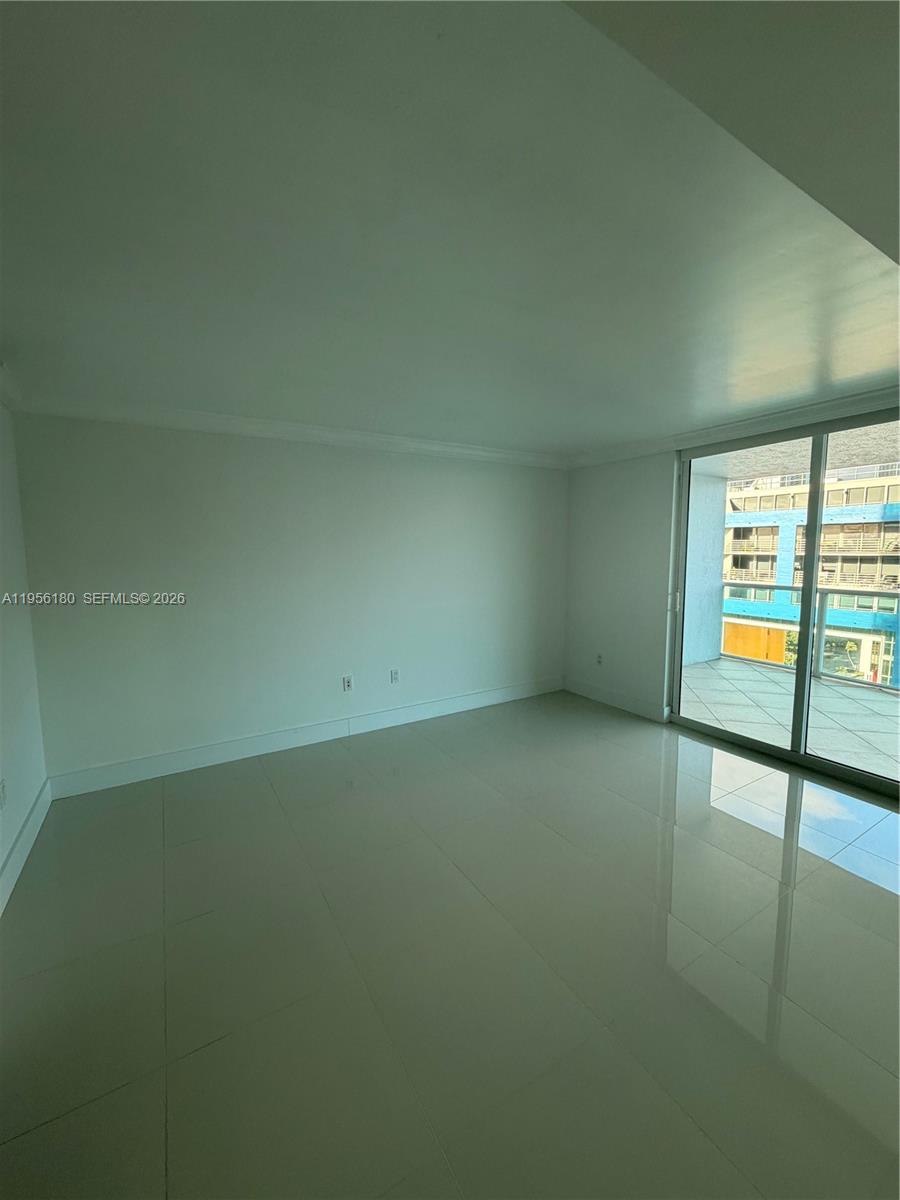 2101 Brickell Avenue, Unit 1504 Miami, FL 33129 - Photo 13 of 15 an empty room with a window
