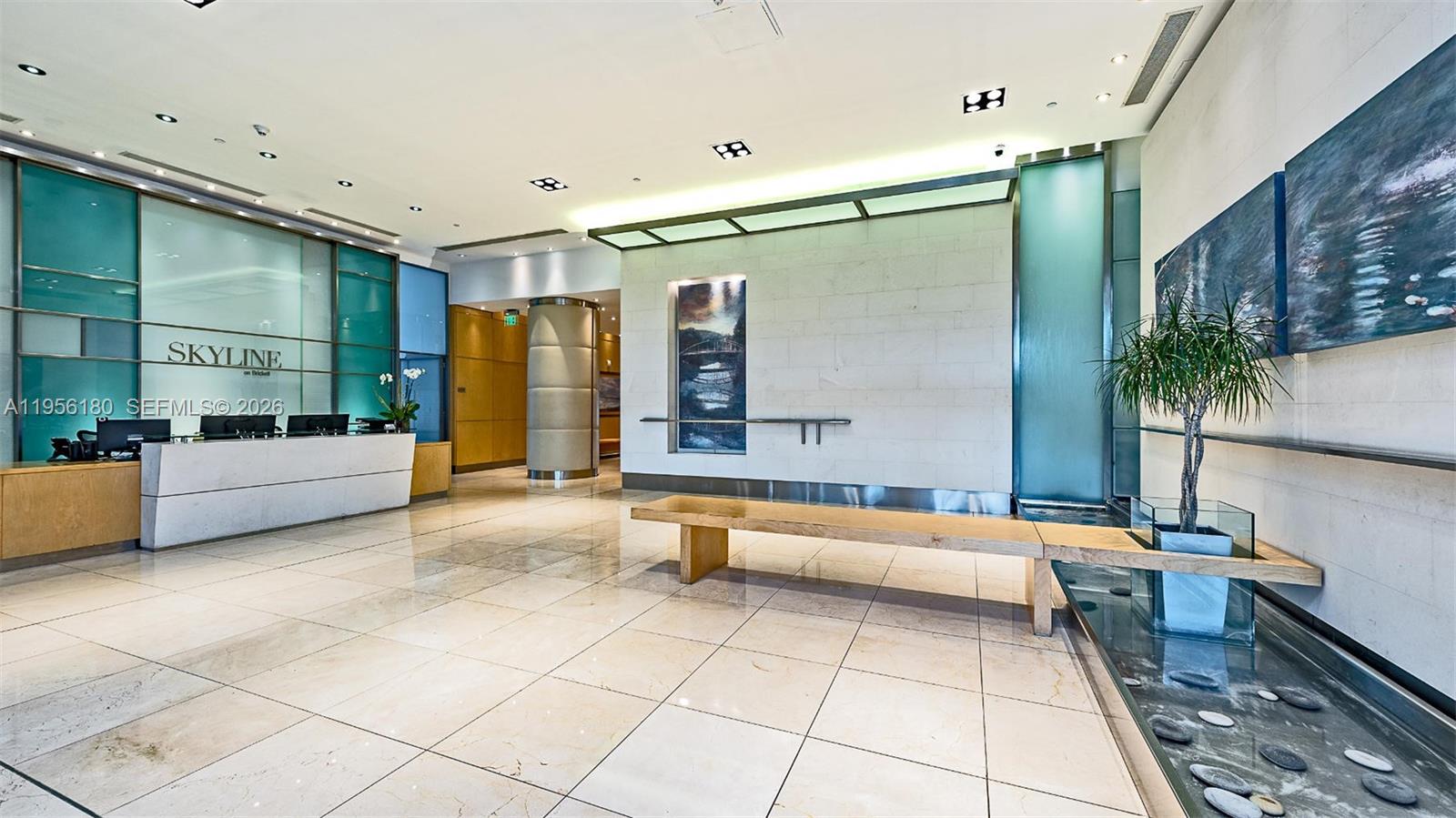 2101 Brickell Avenue, Unit 1504 Miami, FL 33129 - Photo 4 of 15 a swimming pool with outdoor seating